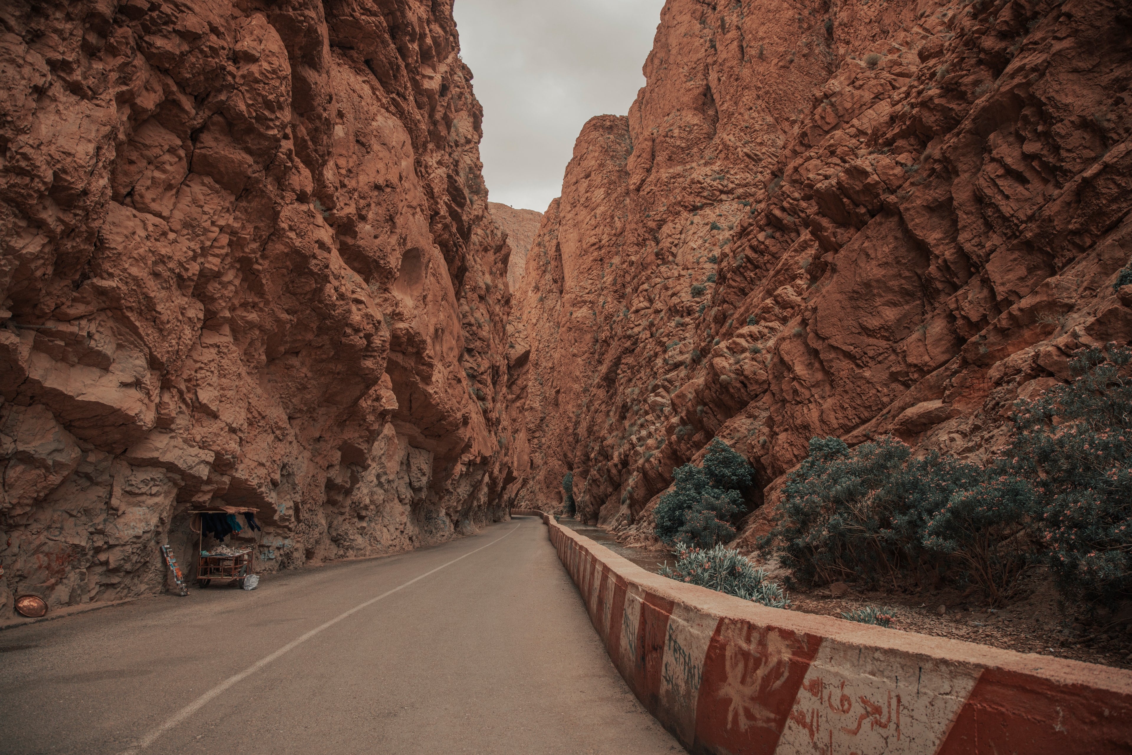 The road running between the sheer red walls of the Todra Gorge